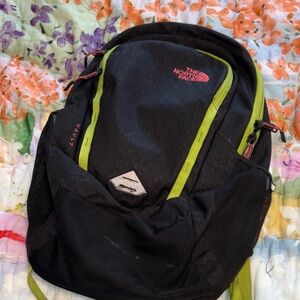 The North Face Black, green and pink backpack